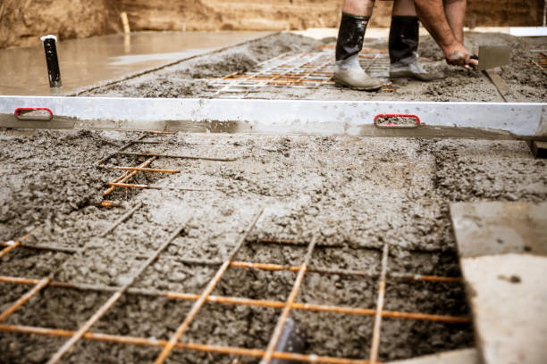 Integrity Paving and Coatings leveling damaged residential concrete slabs carefully