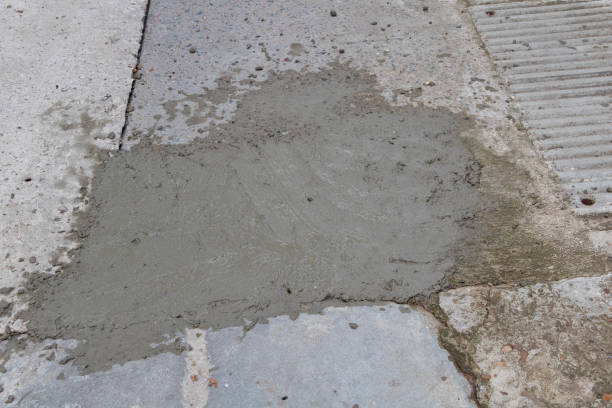 concrete repair work on residential driveway Pflugerville TX