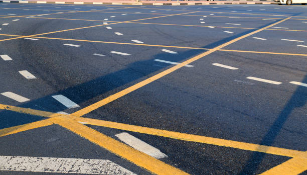 Integrity Paving and Coatings leveling damaged residential concrete slabs carefully