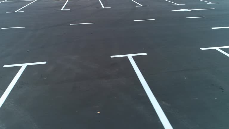 Parking lot striping crew applying durable lines in Round Rock Texas