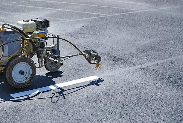 Professional pavement markings creating organized commercial parking Westlake