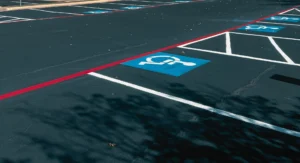 Worn parking lines being refreshed with professional striping at a commercial lot in Smithville, TX.