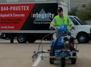 Professionally striped commercial parking lot with clear traffic markings in Lockhart, TX. Parkinng lot striping near me